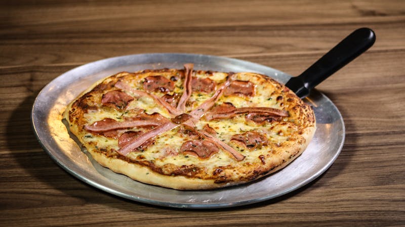 Deluxe Pizza with multiple toppings