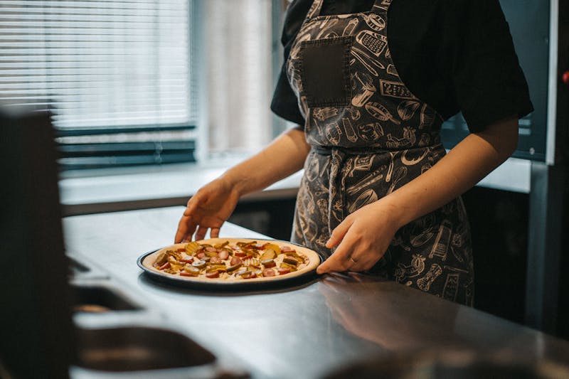 Imos Pizza kitchen with freshly made pizzas